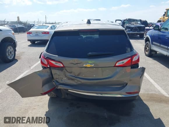 ✅ 2018 Chevrolet Equinox LT • VIN: 3GNAXJEV1JS564204 • Lot: 42823651. Listed on IAAI with 56,842 mi. Free auction sales archive from the USA and detailed vehicle history report at DreamBid. Image 6.