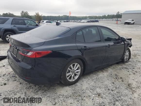 2025 Toyota Camry LE with VIN 4T1DAACK6SU196115, listed as a Copart auction lot 81836425 with 5,440 mi miles and Salvage title. Bid and sale history available at DreamBid. Image 3.