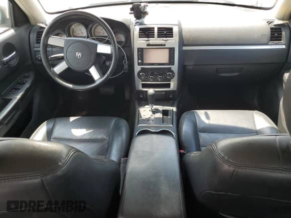 2009 Dodge Charger с VIN 2B3KK33V09H605271, выставлен на аукционе Copart как лот 66599055 с пробегом 158 464 миль миль и Списание • Salvage title. История ставок и продаж доступна на DreamBid. Изображение 8.