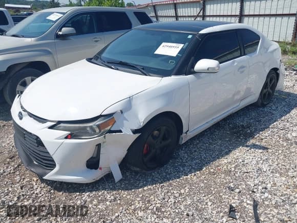 ✅ 2014 Scion tC • VIN: JTKJF5C76E3071517 • Lot: 42940555. Listed on IAAI with 165,254 mi. Free auction sales archive from the USA and detailed vehicle history report at DreamBid. Image 21.