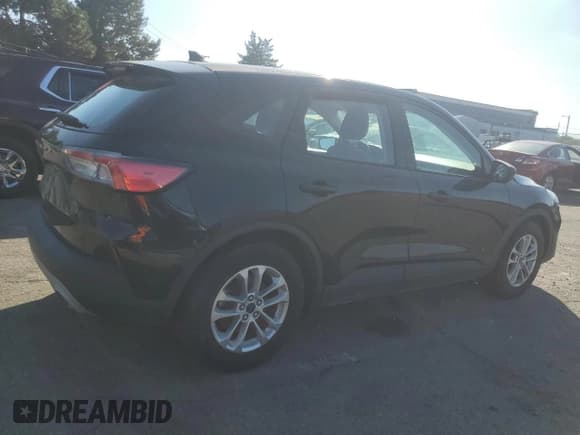 ✅ 2021 Ford Escape S • VIN: 1FMCU0F60MUB00056 • Lot: 84601445. Listed on Copart with 56,022 mi. Free auction sales archive from the USA and detailed vehicle history report at DreamBid. Image 3.