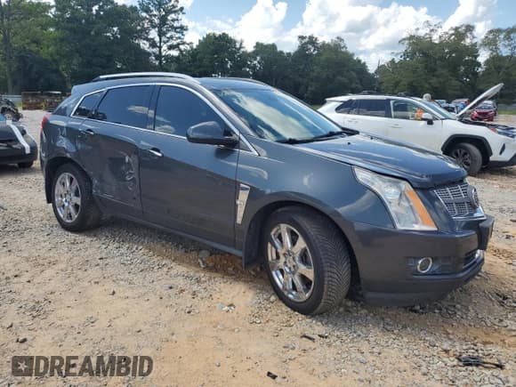 ✅ 2011 Cadillac SRX Premium Collection • VIN: 3GYFNFEY7BS505200 • Lot: 64261755. Wystawiony na Copart z przebiegiem Nie podano. Bezpłatny archiwum sprzedaży aukcyjnych z USA i szczegółowy raport historii pojazdu na DreamBid. Zdjęcie 4.