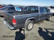 ✅ 2002 Dodge Dakota • VIN: 1B7GL12X02S577219 • Lot: 77067374. Wystawiony na Copart z przebiegiem 181 351 mil. Bezpłatny archiwum sprzedaży aukcyjnych z USA i szczegółowy raport historii pojazdu na DreamBid. Zdjęcie 3.
