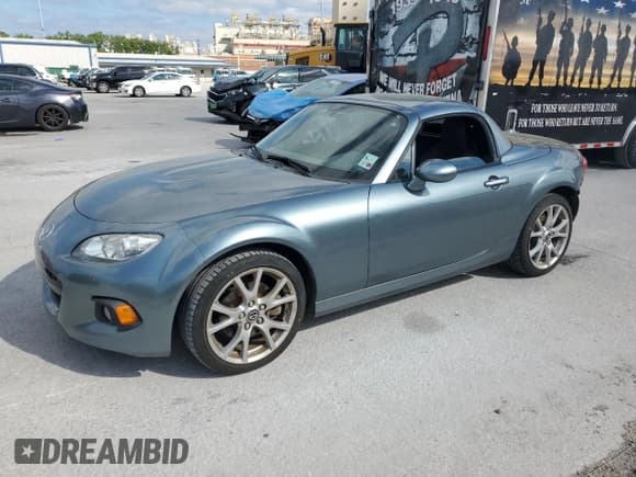 ✅ 2013 Mazda MX-5 Miata Grand Touring • VIN: JM1NC2PF6D0227802 • Lot: 53109485. Listed on Copart with 71,365 mi. Free auction sales archive from the USA and detailed vehicle history report at DreamBid. Image 1.