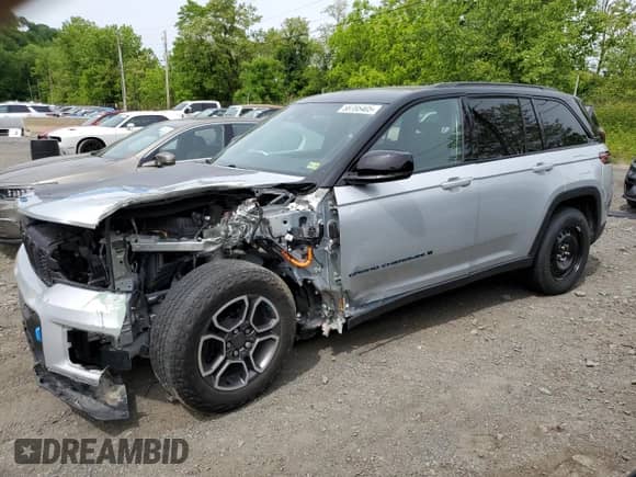 2022 Jeep Grand Cherokee Trailhawk z VIN 1C4RJYC62N8715910, wystawiony jako Copart lot #58785405 z przebiegiem 21 976 mil mil oraz Szkoda całkowita • Salvage title. Historia ofert i sprzedaży dostępna na DreamBid. Obrazek 1.