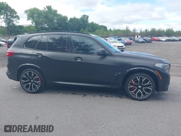 ✅ 2022 BMW X5 M • VIN: 5YMJU0C07N9M50016 • Lot: 42784029. Listed on IAAI with 35,021 mi. Free auction sales archive from the USA and detailed vehicle history report at DreamBid. Image 13.
