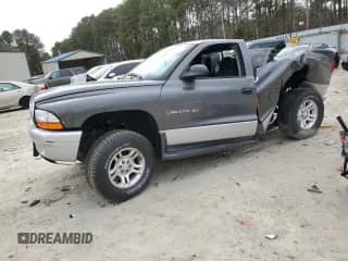 2002 Dodge Dakota с VIN 1B7GG46X32S549642, выставлен на аукционе Copart как лот 49134625 с пробегом 137 581 миль миль и Списание • Salvage title. История ставок и продаж доступна на DreamBid. Изображение 1.