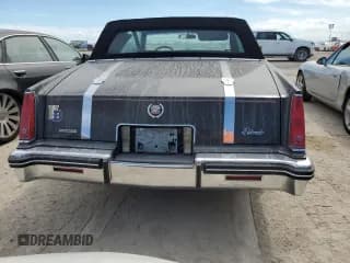 ✅ 1985 Cadillac Eldorado • VIN: 1G6EL578XFE614641 • Лот: 75663984. Опубликован ранее на Copart с пробегом 54 128 миль. Бесплатный доступ к архиву аукционных продаж из США и подробный отчёт об истории автомобиля на DreamBid. Изображение 6.