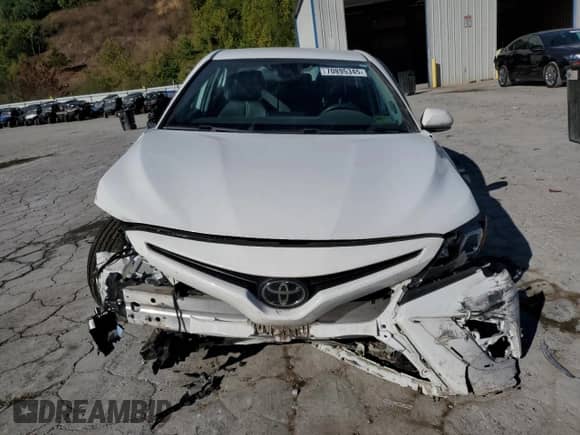 2022 Toyota Camry SE z VIN 4T1G11AK1NU666409, wystawiony jako Copart lot #70895345 z przebiegiem 109 652 mil mil oraz Szkoda całkowita • Salvage title. Historia ofert i sprzedaży dostępna na DreamBid. Obrazek 5.