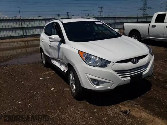 2013 Hyundai Tucson GLS z VIN KM8JU3AC3DU750666, wystawiony jako Copart lot #62409444 z przebiegiem 146 527 mil mil oraz Szkoda całkowita • Salvage title. Historia ofert i sprzedaży dostępna na DreamBid. Obrazek 11.