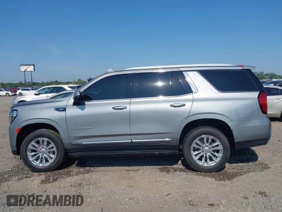 ✅ 2023 GMC Yukon SLT • VIN: 1GKS2BKD9PR210427 • Lot: 42472635. Wystawiony na IAAI z przebiegiem 24 551 mil. Bezpłatny archiwum sprzedaży aukcyjnych z USA i szczegółowy raport historii pojazdu na DreamBid. Zdjęcie 14.