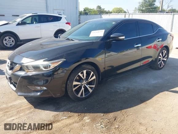 ✅ 2017 Nissan Maxima Platinum • VIN: 1N4AA6AP6HC401584 • Lot: 43244633. Listed on IAAI with 101,577 mi. Free auction sales archive from the USA and detailed vehicle history report at DreamBid. Image 2.