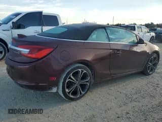 ✅ 2016 Buick Cascada Premium • VIN: W04WT3N55GG121853 • Лот: 73872674. Опубликован ранее на Copart с пробегом 20 274 миль. Бесплатный доступ к архиву аукционных продаж из США и подробный отчёт об истории автомобиля на DreamBid. Изображение 3.
