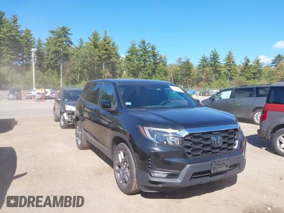 ✅ 2023 Honda Passport EX-L • VIN: 5FNYF8H54PB013071 • Lot: 43246503. Listed on IAAI with 35,120 mi. Free auction sales archive from the USA and detailed vehicle history report at DreamBid. Image 1.