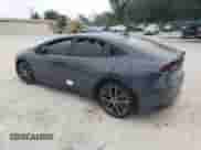 2023 Toyota Prius LE с VIN JTDACAAU9P3003815, выставлен на аукционе Copart как лот 69556365 с пробегом 60 912 миль миль и Списание • Salvage title. История ставок и продаж доступна на DreamBid. Изображение 2.