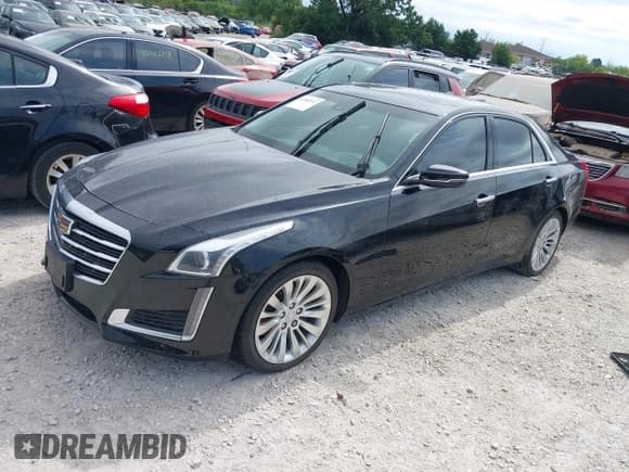 ✅ 2015 Cadillac CTS Luxury AWD • VIN: 1G6AX5SX5F0109217 • Lot: 42983192. Listed on IAAI with 54,841 mi. Free auction sales archive from the USA and detailed vehicle history report at DreamBid. Image 2.