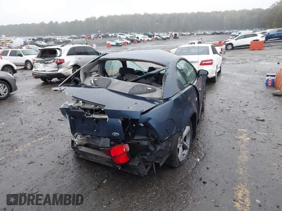 ✅ 2002 Ford Mustang Standard • VIN: 1FAFP40442F142518 • Lot: 43550203. Listed on IAAI with Not provided. Free auction sales archive from the USA and detailed vehicle history report at DreamBid. Image 4.