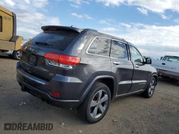 ✅ 2015 Jeep Grand Cherokee Overland • VIN: 1C4RJFCM8FC871547 • Lot: 85890835. Listed on Copart with 122,735 mi. Free auction sales archive from the USA and detailed vehicle history report at DreamBid. Image 3.