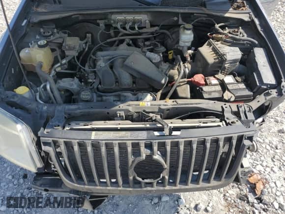 2008 Mercury Mariner Premier с VIN 4M2CU97118KJ42453, выставлен на аукционе Copart как лот 58054305 с пробегом 183 669 миль миль и Списание • Salvage title. История ставок и продаж доступна на DreamBid. Изображение 12.