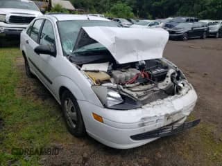 ✅ 2004 Ford Focus LX • VIN: 1FAFP33P74W164340 • Lot: 70513195. Wystawiony na Copart z przebiegiem 186 485 mil. Bezpłatny archiwum sprzedaży aukcyjnych z USA i szczegółowy raport historii pojazdu na DreamBid. Zdjęcie 4.