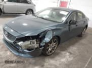 ✅ 2014 Mazda 6 i Grand Touring • VIN: JM1GJ1W67E1159404 • Lot: 42702402. Listed on IAAI with 107,039 mi. Free auction sales archive from the USA and detailed vehicle history report at DreamBid. Image 2.