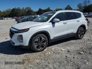 ✅ 2020 Hyundai Santa Fe Limited • VIN: 5NMS5CAA0LH290621 • Лот: 82396565. Опубликован ранее на Copart с пробегом 61 752 миль. Бесплатный доступ к архиву аукционных продаж из США и подробный отчёт об истории автомобиля на DreamBid. Изображение 1.