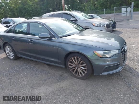 ✅ 2014 Audi A6 Prestige • VIN: WAUHGAFC0EN048045 • Lot: 42582288. Listed on IAAI with 150,114 mi. Free auction sales archive from the USA and detailed vehicle history report at DreamBid. Image 1.