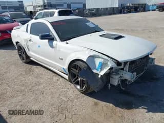 ✅ 2005 Ford Mustang GT Deluxe • VIN: 1ZVFT82H755246621 • Lot: 43663164. Listed on IAAI with 219,369 mi. Free auction sales archive from the USA and detailed vehicle history report at DreamBid. Image 1.