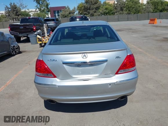 ✅ 2006 Acura RL • VIN: JH4KB16556C007009 • Lot: 42544310. Listed on IAAI with 232,005 mi. Free auction sales archive from the USA and detailed vehicle history report at DreamBid. Image 16.