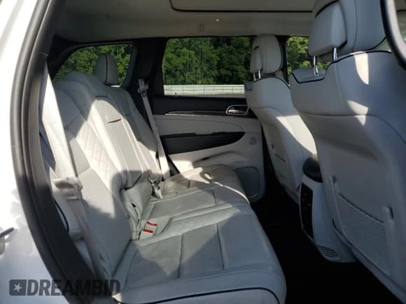 ✅ 2018 Jeep Grand Cherokee Summit • VIN: 1C4RJFJG2JC450588 • Lot: 66011575. Listed on Copart with 49,175 mi. Free auction sales archive from the USA and detailed vehicle history report at DreamBid. Image 11.