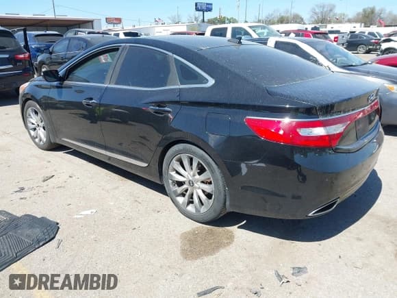 ✅ 2013 Hyundai Azera • VIN: KMHFH4JG4DA287957 • Лот: 41763771. Опубликован ранее на IAAI с пробегом 165 764 миль. Бесплатный доступ к архиву аукционных продаж из США и подробный отчёт об истории автомобиля на DreamBid. Изображение 3.