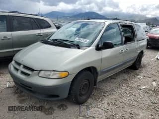 ✅ 1999 Dodge Caravan SE • VIN: 1B4GT44L0XB893221 • Lot: 56673125. Listed on Copart with 242,497 mi. Free auction sales archive from the USA and detailed vehicle history report at DreamBid. Image 1.