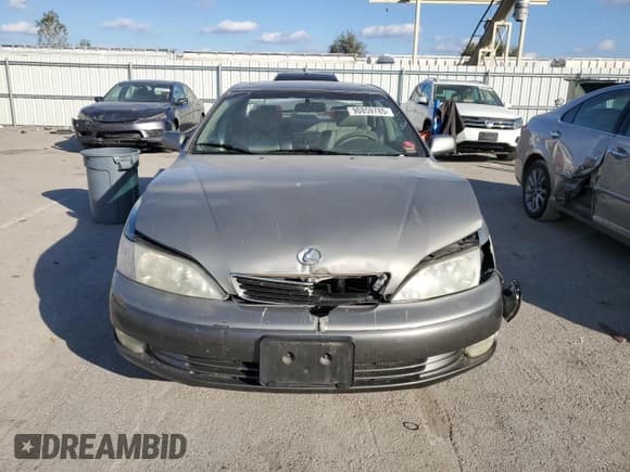 ✅ 1999 Lexus ES 300 • VIN: JT8BF28G7X0207952 • Lot: 90859785. Listed on Copart with 160,420 mi. Free auction sales archive from the USA and detailed vehicle history report at DreamBid. Image 5.