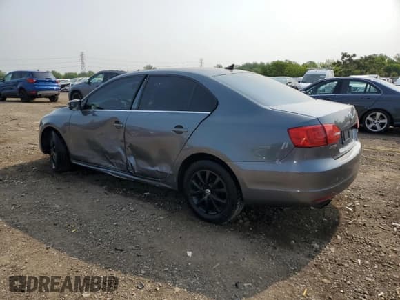 ✅ 2013 Volkswagen Jetta SE • VIN: 3VWDX7AJXDM356419 • Lot: 59921705. Listed on Copart with 148,844 mi. Free auction sales archive from the USA and detailed vehicle history report at DreamBid. Image 2.