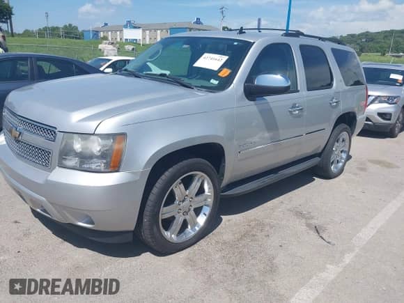 2011 Chevrolet Tahoe LTZ with VIN 1GNSKCE03BR368837, listed as a IAAI auction lot 42741642 with 166,196 mi miles and . Bid and sale history available at DreamBid. Image 18.