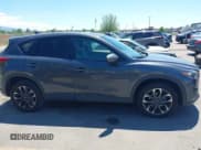 ✅ 2016 Mazda CX-5 Grand Touring • VIN: JM3KE4DY3G0912088 • Lot: 42203530. Wystawiony na IAAI z przebiegiem 86 914 mil. Bezpłatny archiwum sprzedaży aukcyjnych z USA i szczegółowy raport historii pojazdu na DreamBid. Zdjęcie 13.