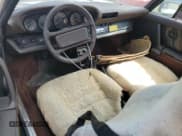 ✅ 1985 Porsche 911 • VIN: WP0EB0913FS170426 • Lot: 75228474. Wystawiony na Copart z przebiegiem 62 230 mil. Bezpłatny archiwum sprzedaży aukcyjnych z USA i szczegółowy raport historii pojazdu na DreamBid. Zdjęcie 8.