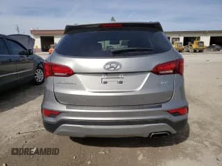 ✅ 2017 Hyundai Santa Fe 2.4L • VIN: 5NMZU3LB5HH002638 • Лот: 42825133. Опубликован ранее на Copart с пробегом 99 604 миль. Бесплатный доступ к архиву аукционных продаж из США и подробный отчёт об истории автомобиля на DreamBid. Изображение 6.