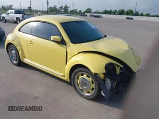 ✅ 2012 Volkswagen Beetle 2.5L • VIN: 3VWJX7AT3CM640610 • Lot: 42337716. Listed on IAAI with 118,557 mi. Free auction sales archive from the USA and detailed vehicle history report at DreamBid. Image 1.