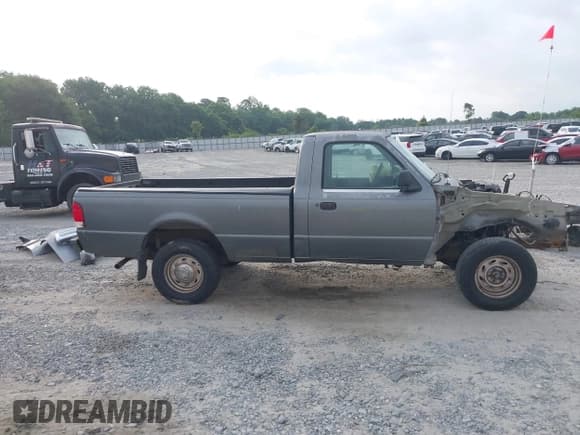 ✅ 2000 Ford Ranger XLT • VIN: 1FTYR10X9YPA39183 • Lot: 42308896. Listed on IAAI with 180,935 mi. Free auction sales archive from the USA and detailed vehicle history report at DreamBid. Image 14.