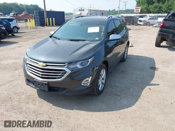 ✅ 2019 Chevrolet Equinox Premier • VIN: 2GNAXNEV4K6184569 • Lot: 42670537. Listed on IAAI with 163,594 mi. Free auction sales archive from the USA and detailed vehicle history report at DreamBid. Image 2.