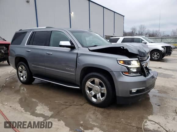 2020 Chevrolet Tahoe Premier with VIN 1GNSKCKC4LR106373, listed as a Copart auction lot 47627615 with 100,511 mi miles and Salvage title. Bid and sale history available at DreamBid. Image 4.