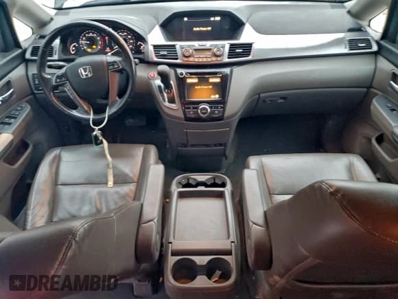 ✅ 2014 Honda Odyssey EX-L • VIN: 5FNRL5H63EB129329 • Lot: 95650655. Listed on Copart with 195,062 mi. Free auction sales archive from the USA and detailed vehicle history report at DreamBid. Image 8.