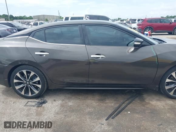 ✅ 2016 Nissan Maxima S • VIN: 1N4AA6AP7GC401110 • Lot: 42653301. Listed on IAAI with 76,609 mi. Free auction sales archive from the USA and detailed vehicle history report at DreamBid. Image 13.