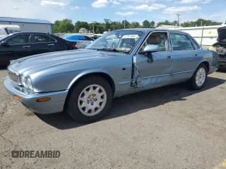 ✅ 2002 Jaguar XJ 8 • VIN: SAJDA14C22LF42909 • Лот: 61797364. Опубликован ранее на Copart с пробегом 155 963 миль. Бесплатный доступ к архиву аукционных продаж из США и подробный отчёт об истории автомобиля на DreamBid. Изображение 1.
