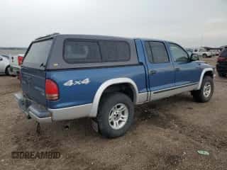 2004 Dodge Dakota SLT z VIN 1D7HG48N04S695750, wystawiony jako Copart lot #61059154 z przebiegiem Nie podano mil oraz Szkoda całkowita • Salvage title. Historia ofert i sprzedaży dostępna na DreamBid. Obrazek 3.