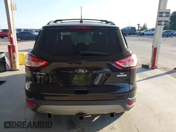 ✅ 2013 Ford Escape SE • VIN: 1FMCU0G93DUC05876 • Lot: 43733326. Listed on IAAI with 164,049 mi. Free auction sales archive from the USA and detailed vehicle history report at DreamBid. Image 17.