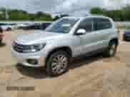 2013 Volkswagen Tiguan SE z VIN WVGAV7AX0DW556558, wystawiony jako Copart lot #55574395 z przebiegiem 94 882 mil mil oraz Szkoda całkowita • Salvage title. Historia ofert i sprzedaży dostępna na DreamBid. Obrazek 1.
