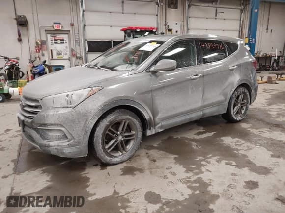 ✅ 2017 Hyundai Santa Fe 2.4L • VIN: 5NMZTDLB9HH000738 • Lot: 43829716. Listed on IAAI with 154,400 mi. Free auction sales archive from the USA and detailed vehicle history report at DreamBid. Image 17.