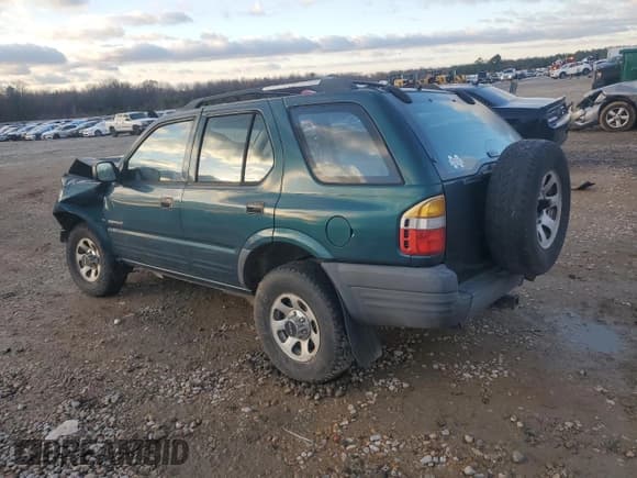 ✅ 1999 Isuzu Rodeo S • VIN: 4S2CK58W2X4312468 • Lot: 85753294. Listed on Copart with Not provided. Free auction sales archive from the USA and detailed vehicle history report at DreamBid. Image 2.